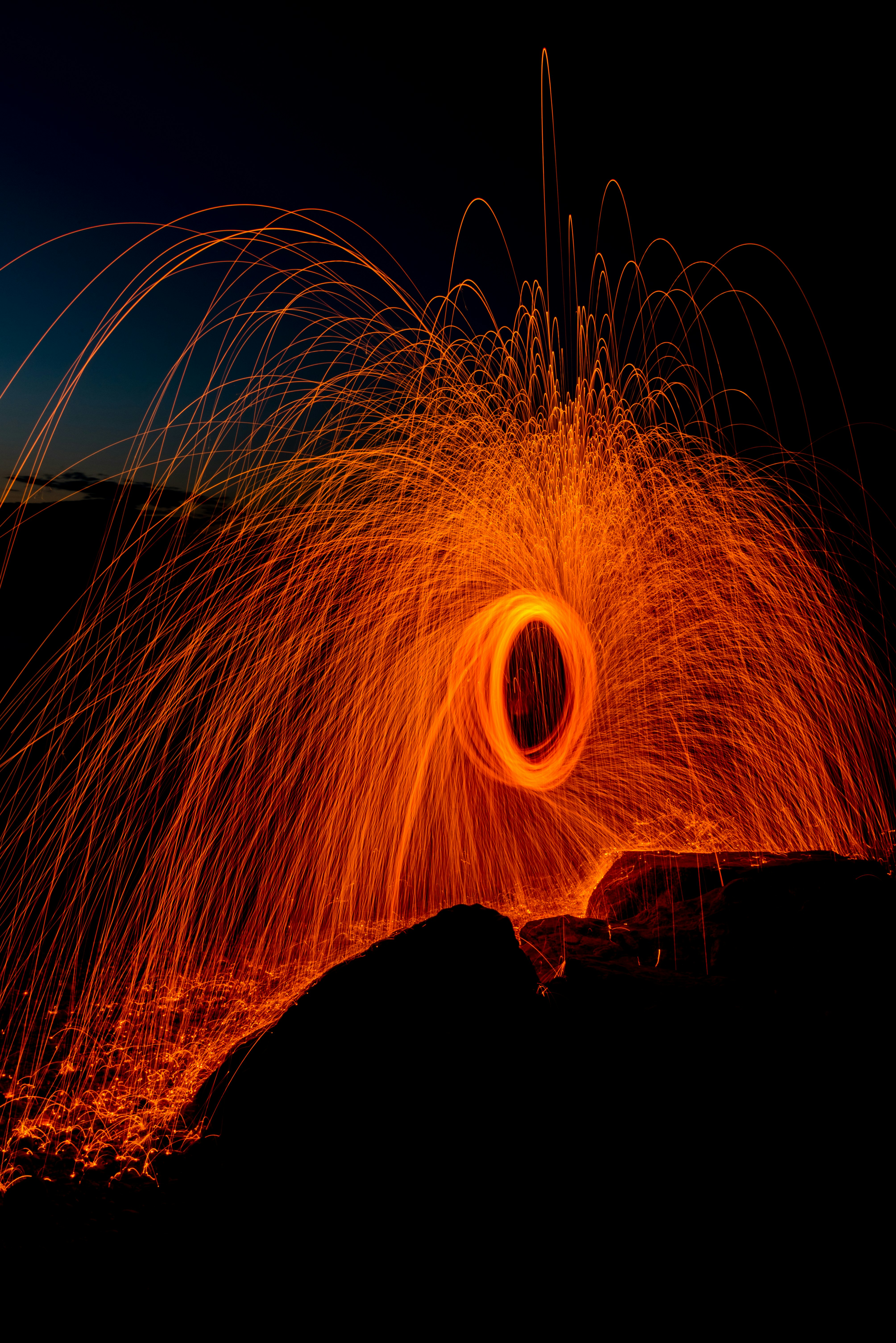 person taking photo of round steel wool